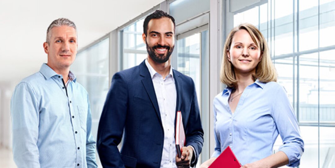 Group photo of 3 smiling Dussmann employees from the commercial services division. 