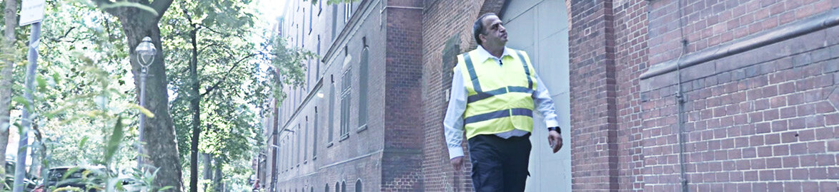 A Dussmann security employee looks after an old building. 