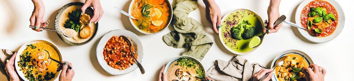 Different dishes placed on a large table