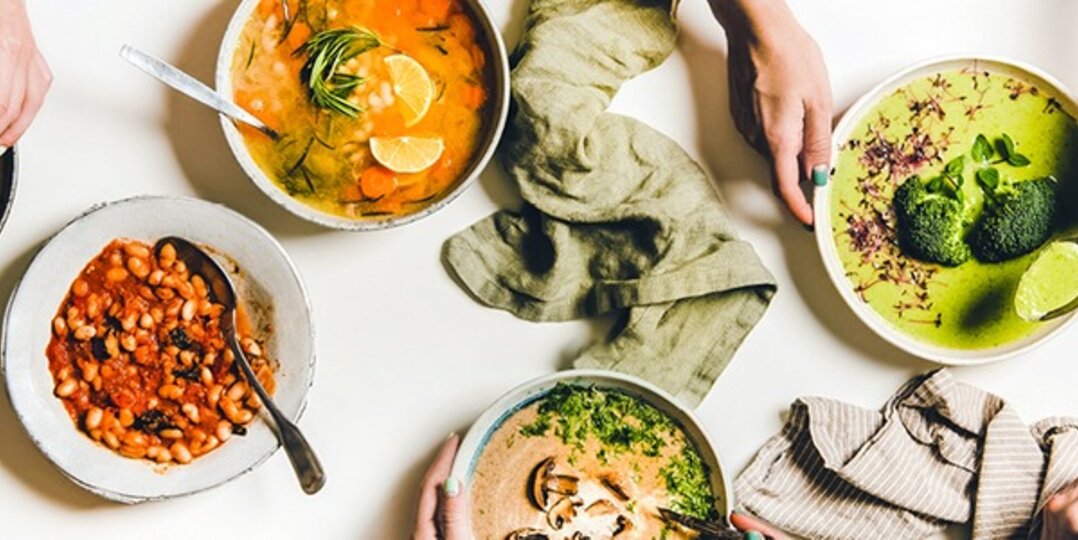 Different dishes placed on a large table